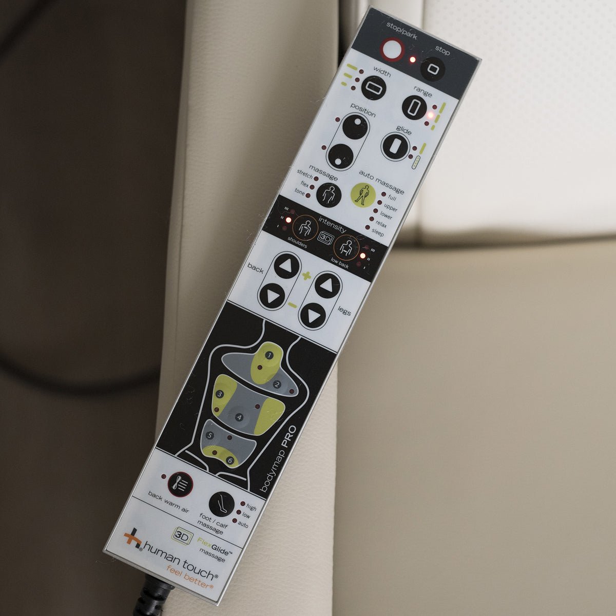 WholeBody 7.1 massage chair remote control with adjustment buttons and massage settings display