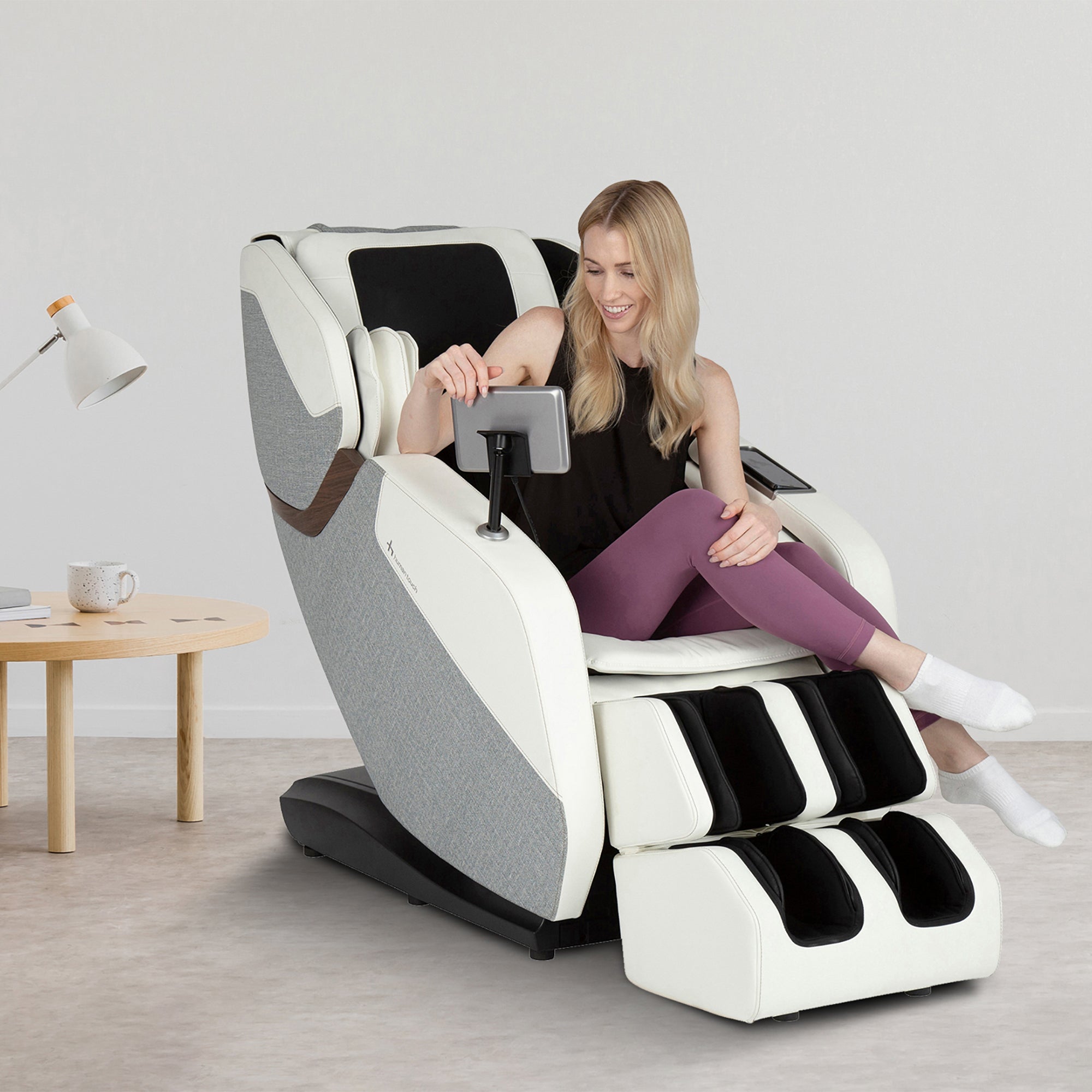 WholeBody ROVE massage chair shown in modern living space with relaxing customer enjoying comfort features